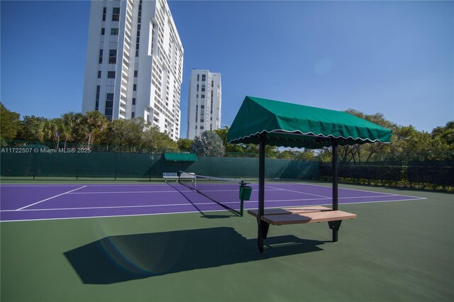 view of sport court featuring basketball hoop