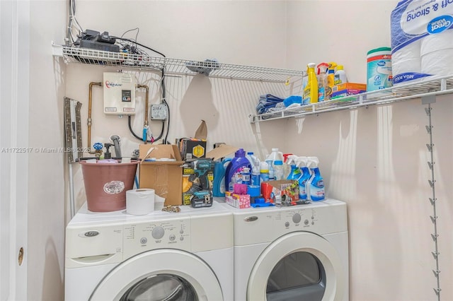 laundry room with independent washer and dryer