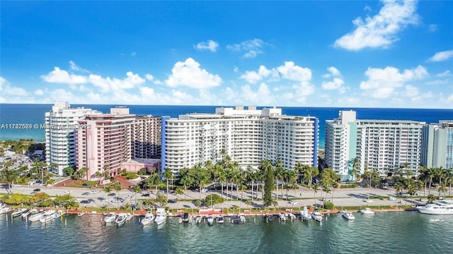 birds eye view of property featuring a water view