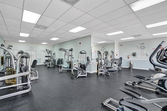 workout area featuring a paneled ceiling