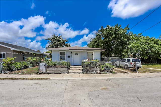651 SW 5th St, Homestead, FL 33030 - bungalow with a fenced front yard and stucco siding