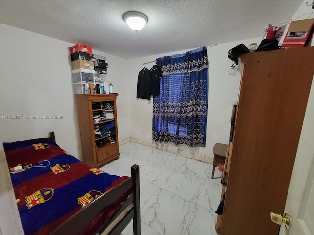 651 SW 5th St, Homestead, FL 33030 - bedroom with a textured ceiling