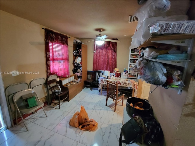 651 SW 5th St, Homestead, FL 33030 - dining area featuring marble look tile flooring and ceiling fan