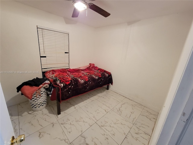 651 SW 5th St, Homestead, FL 33030 - bedroom with marble look tile flooring and ceiling fan