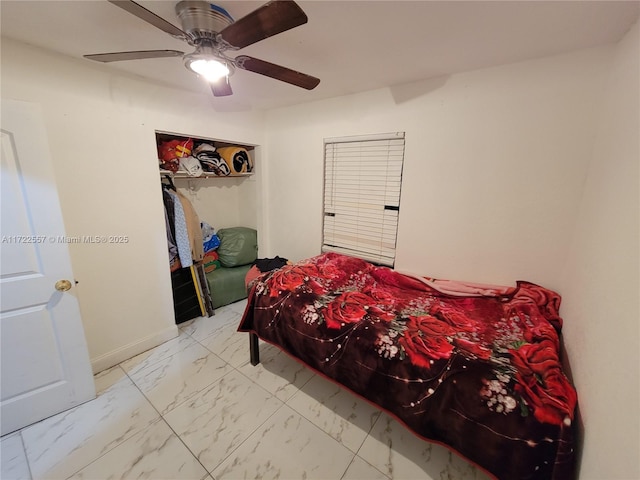 651 SW 5th St, Homestead, FL 33030 - bedroom featuring marble finish floors, a ceiling fan, and a closet