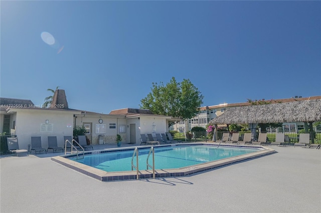 view of swimming pool featuring a patio