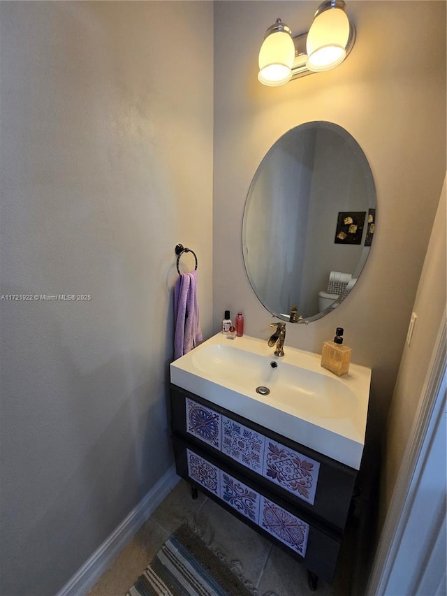 bathroom featuring tile patterned floors and vanity