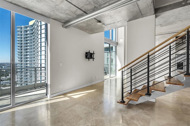 interior space featuring floor to ceiling windows