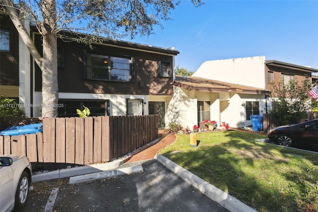 view of front of house with a front lawn