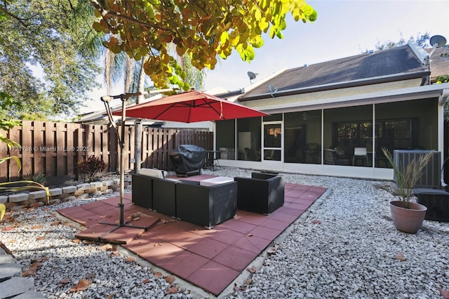 view of patio / terrace with an outdoor hangout area and a sunroom