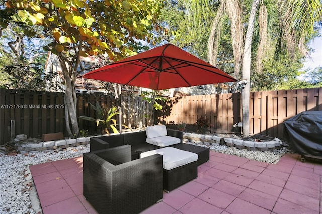 view of patio featuring outdoor lounge area and area for grilling