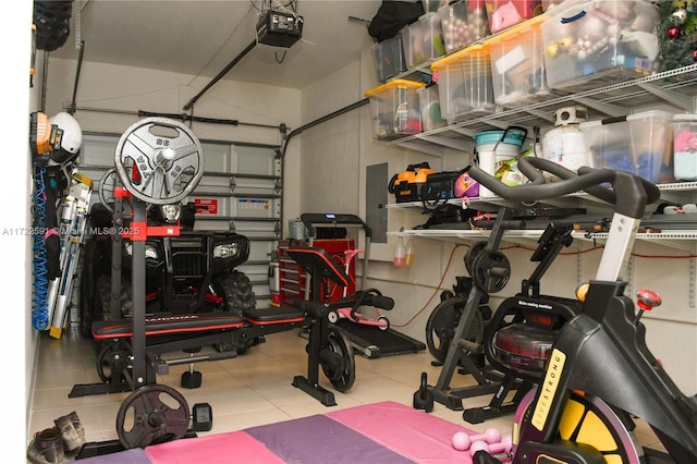 garage with electric panel and a garage door opener