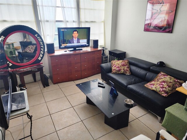 1351 NE Miami Gardens Dr Unit 1025E, Miami, FL 33179 - living room featuring light tile patterned flooring
