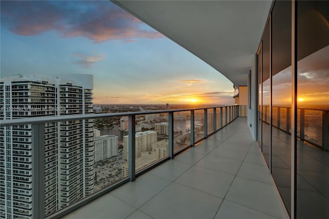 view of balcony at dusk