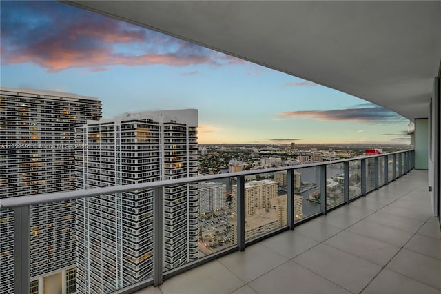 view of balcony at dusk