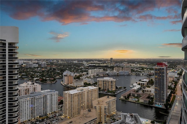 property's view of city featuring a water view