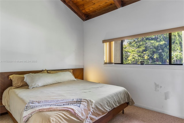 bedroom with light carpet, vaulted ceiling, and wooden ceiling