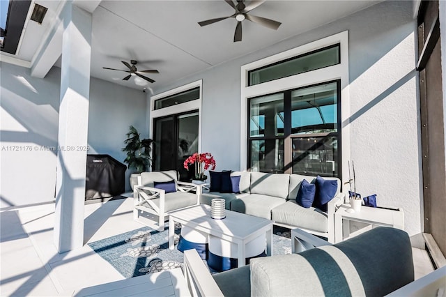 view of patio with an outdoor living space, ceiling fan, and a grill