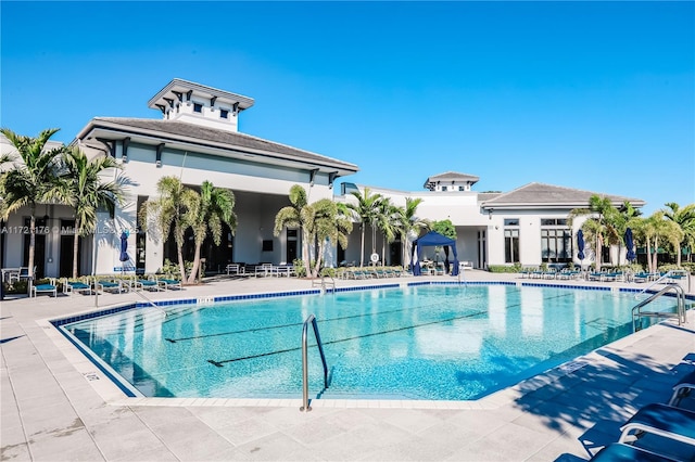 view of swimming pool with a patio