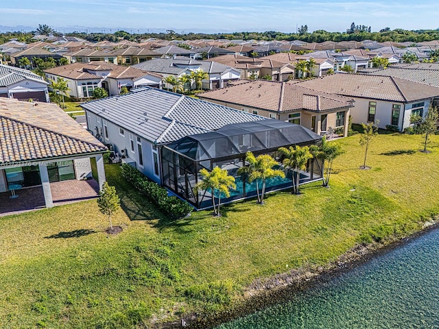 bird's eye view with a water view