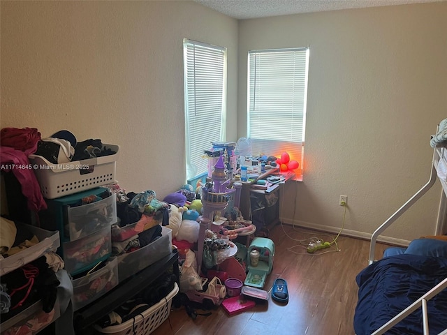 bedroom featuring hardwood / wood-style flooring