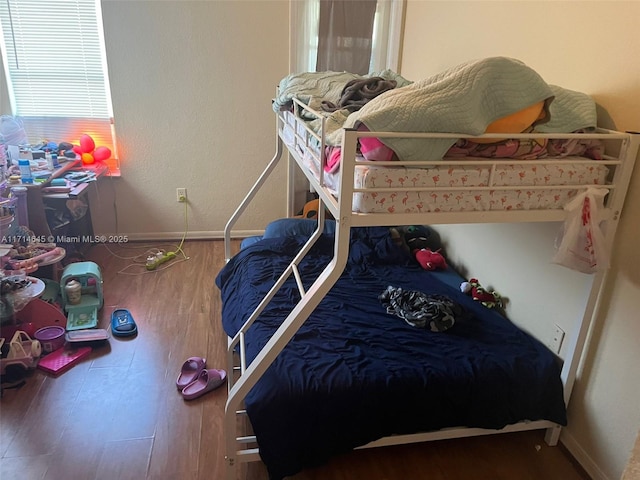 bedroom featuring hardwood / wood-style floors