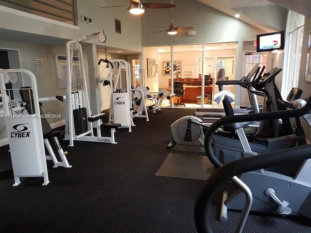 gym with carpet flooring, ceiling fan, and high vaulted ceiling