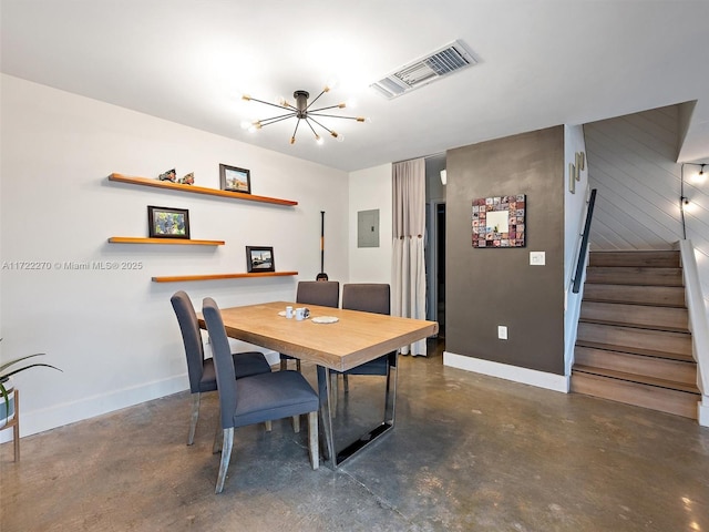 dining area with electric panel and a chandelier