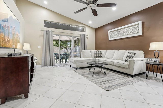 living room with ceiling fan, light tile patterned floors, and high vaulted ceiling