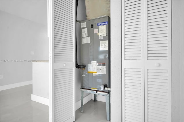 utility room featuring heating unit