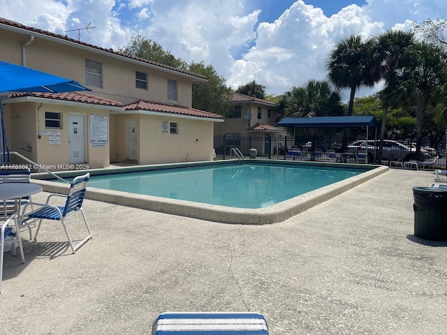 view of pool with a patio area