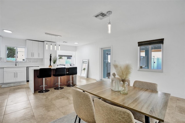 tiled dining space with sink