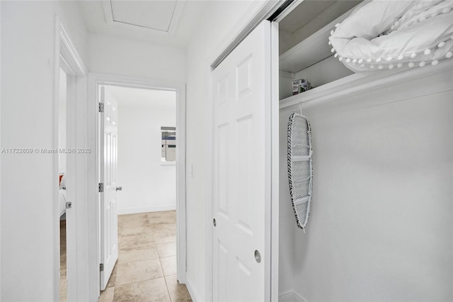 hallway with light tile patterned flooring