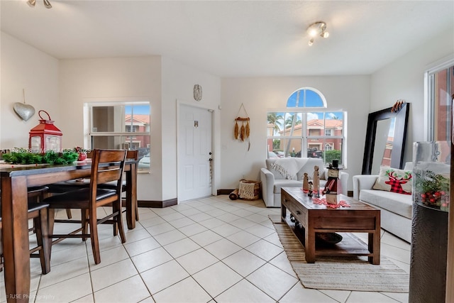 living room with light tile patterned flooring