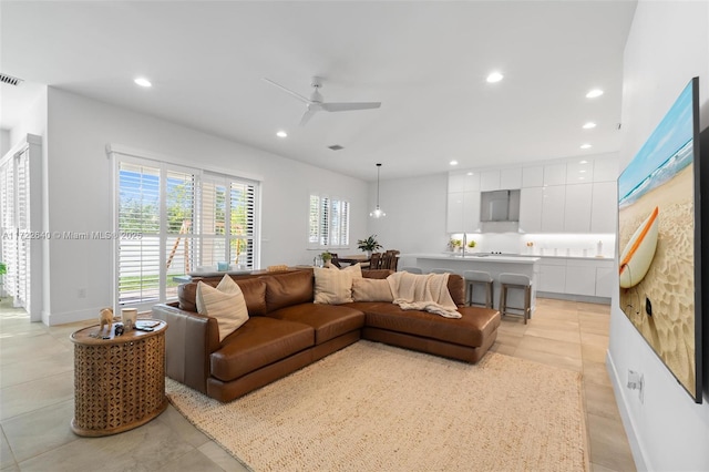 living room with ceiling fan