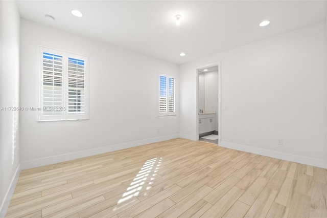 empty room featuring light hardwood / wood-style floors