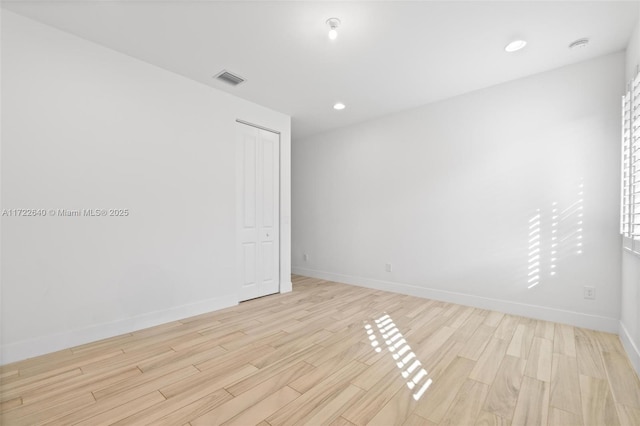 empty room featuring light hardwood / wood-style flooring