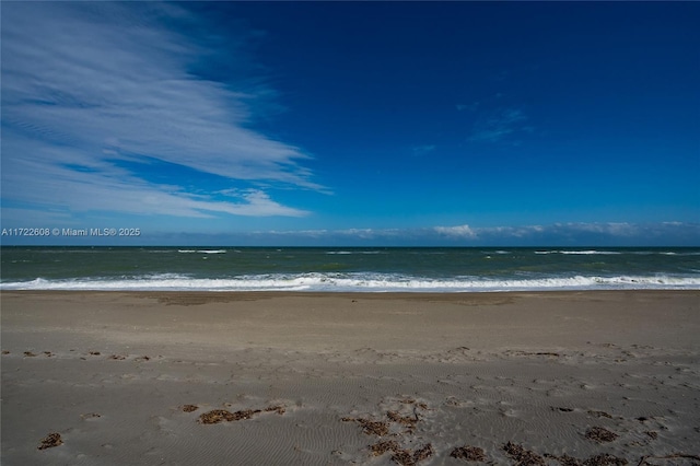 view of water feature featuring a beach view