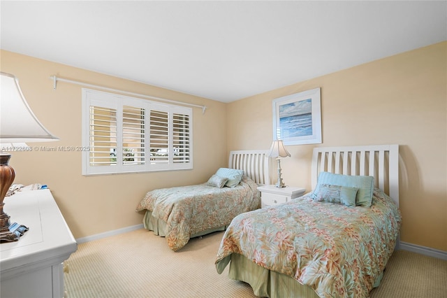 bedroom with light carpet