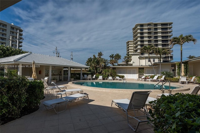 view of pool featuring a patio area