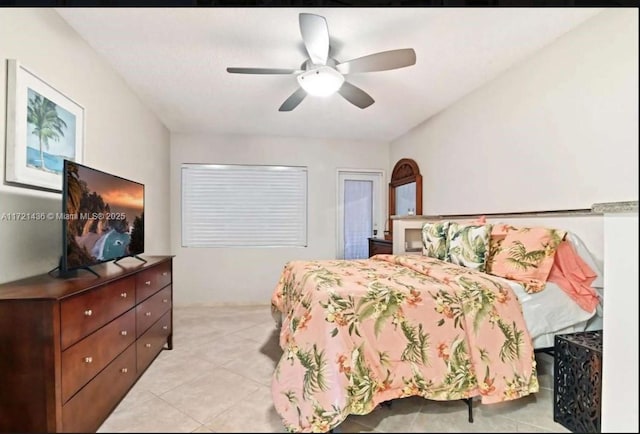 tiled bedroom with ceiling fan