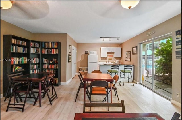 dining area featuring light hardwood / wood-style floors