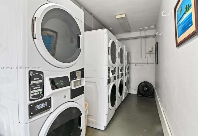 laundry area with washer and dryer and stacked washer and dryer