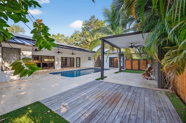 1511 SW 30th Pl, Fort Lauderdale, FL 33315 - outdoor pool featuring ceiling fan, a patio area, and a wooden deck