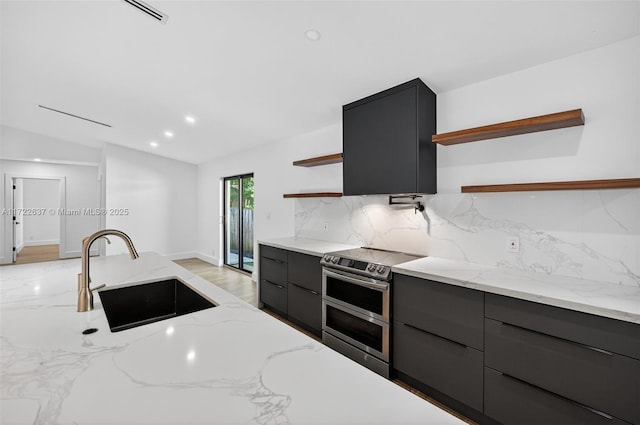 1511 SW 30th Pl, Fort Lauderdale, FL 33315 - kitchen featuring open shelves, double oven range, modern cabinets, backsplash, and vaulted ceiling