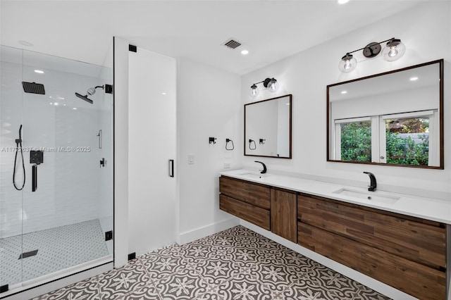 1511 SW 30th Pl, Fort Lauderdale, FL 33315 - bathroom featuring a shower stall, double vanity, and recessed lighting