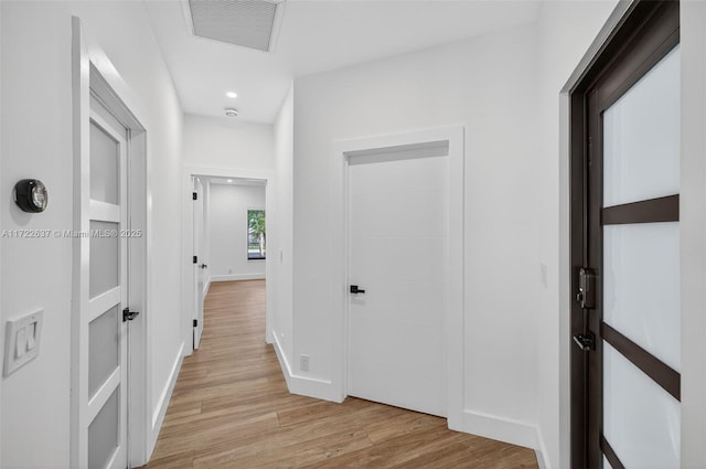 1511 SW 30th Pl, Fort Lauderdale, FL 33315 - hallway featuring light wood-style floors and recessed lighting