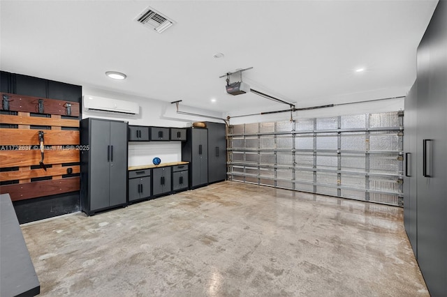 1511 SW 30th Pl, Fort Lauderdale, FL 33315 - garage with a wall mounted AC and a garage door opener