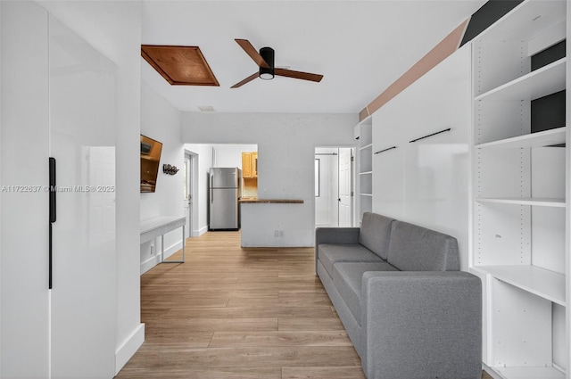 1511 SW 30th Pl, Fort Lauderdale, FL 33315 - living room featuring ceiling fan and light wood-style flooring