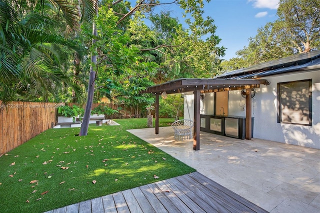1511 SW 30th Pl, Fort Lauderdale, FL 33315 - fenced backyard featuring area for grilling and a patio
